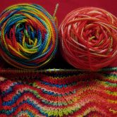 Photo of knitting and balls of yarn