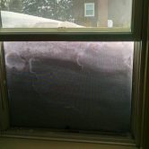 Snow high enough to block first floor window