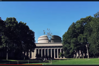 Screen capture of Pi Day video, with drones flying out of MIT dome