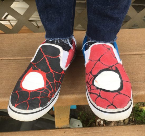 Photo of the co-author's feet wearing Spider-Man themed shoes